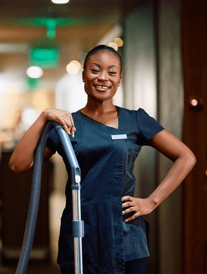 African American cleaning staff member
